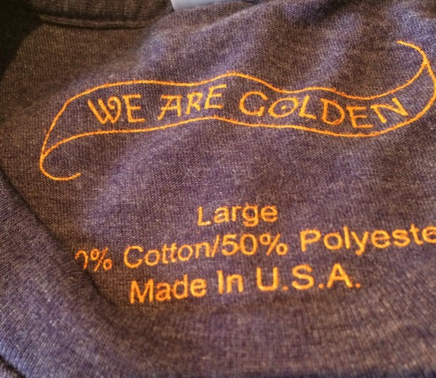 Printed Tag on a We Are Golden T-shirt